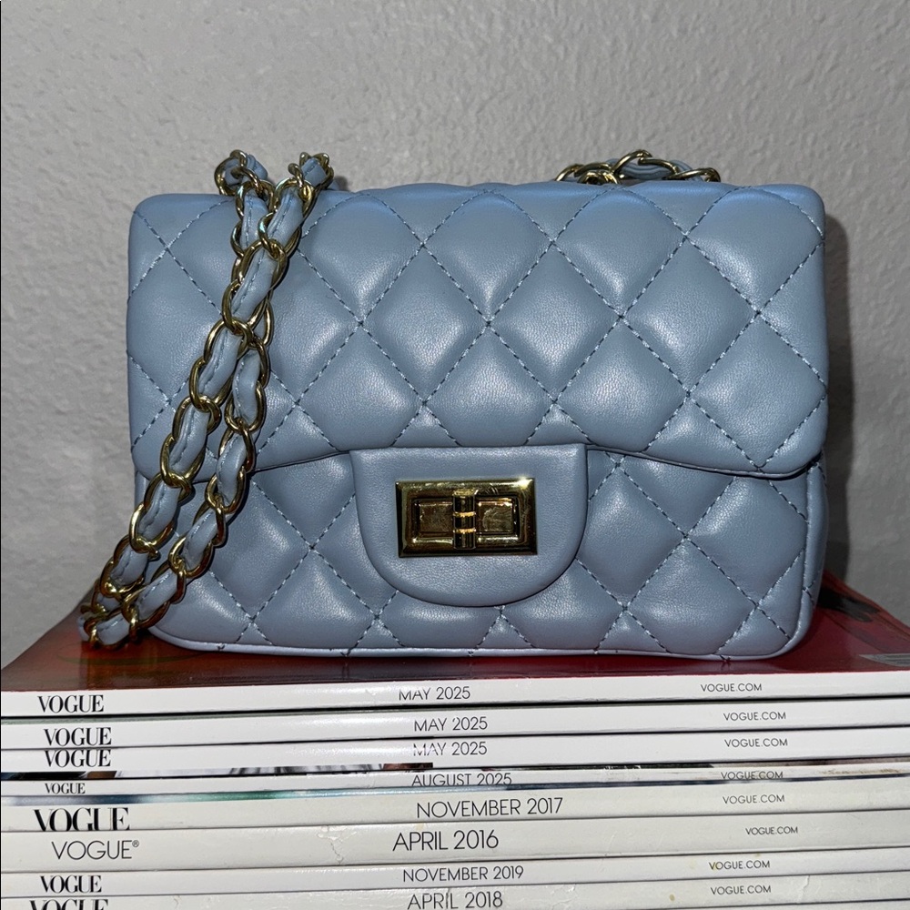 Quilted Light Blue Handbag with Gold Clasp